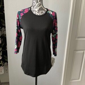 Black quarter cut sleeve with hidden Mickey in flowers on the sleeves.